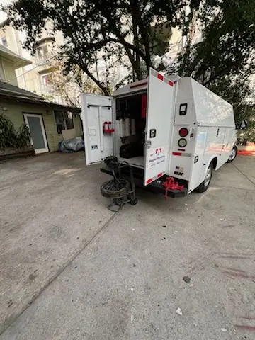 Magnet Plumbing service vehicle on-site for Grease Trap Cleaning in Central Hollywood